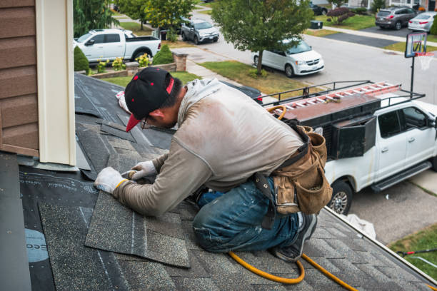 Professional Roofing technician working in Keuka Park, NY